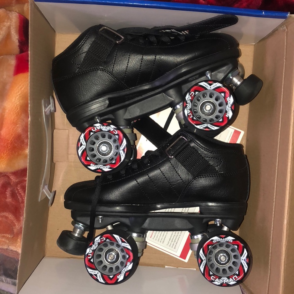 Black red wheeled skates